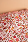 Coral Haze Reversible Floral Quilt